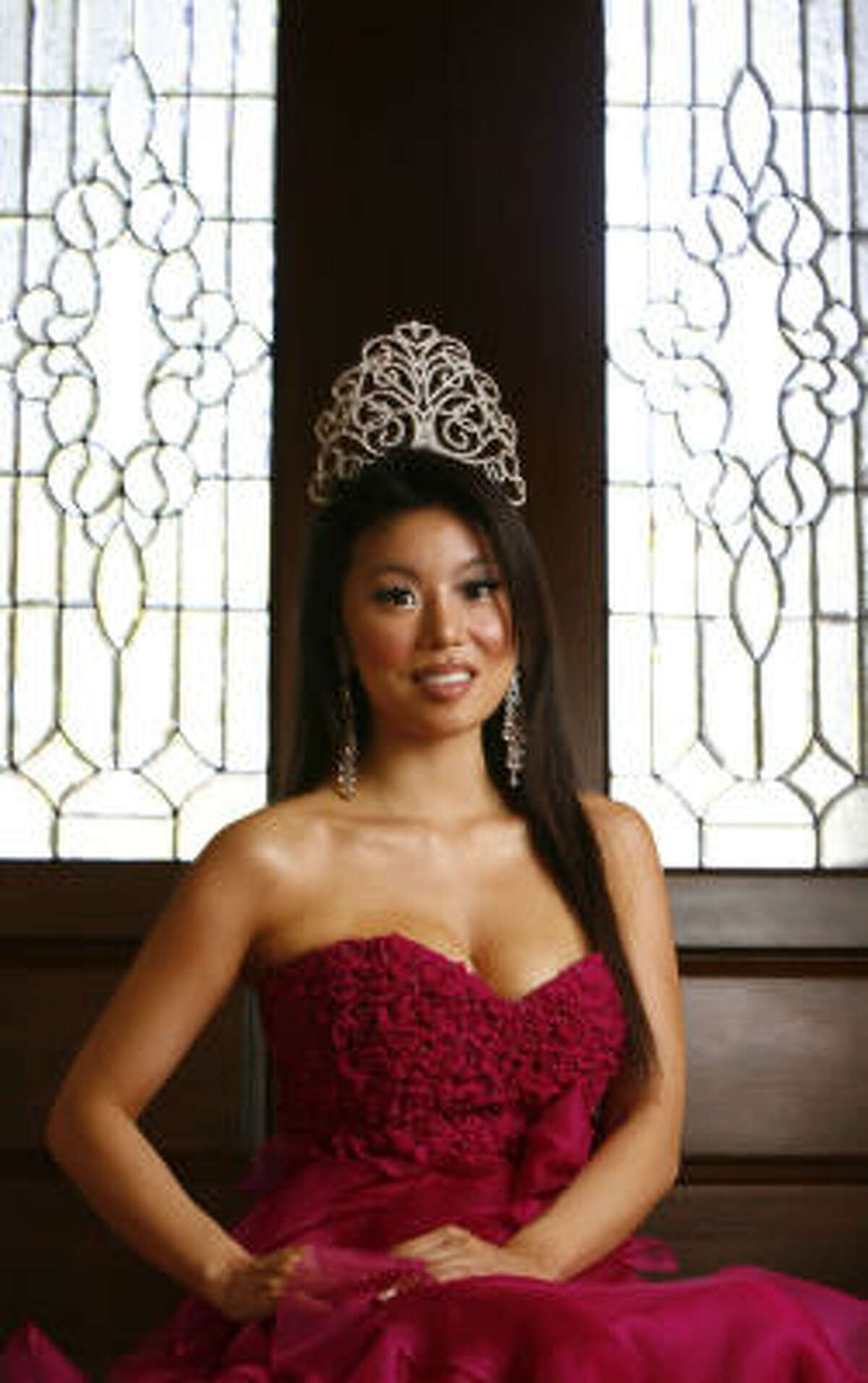 Yoo, who was crowned a few months ago, poses at her home in Katy.