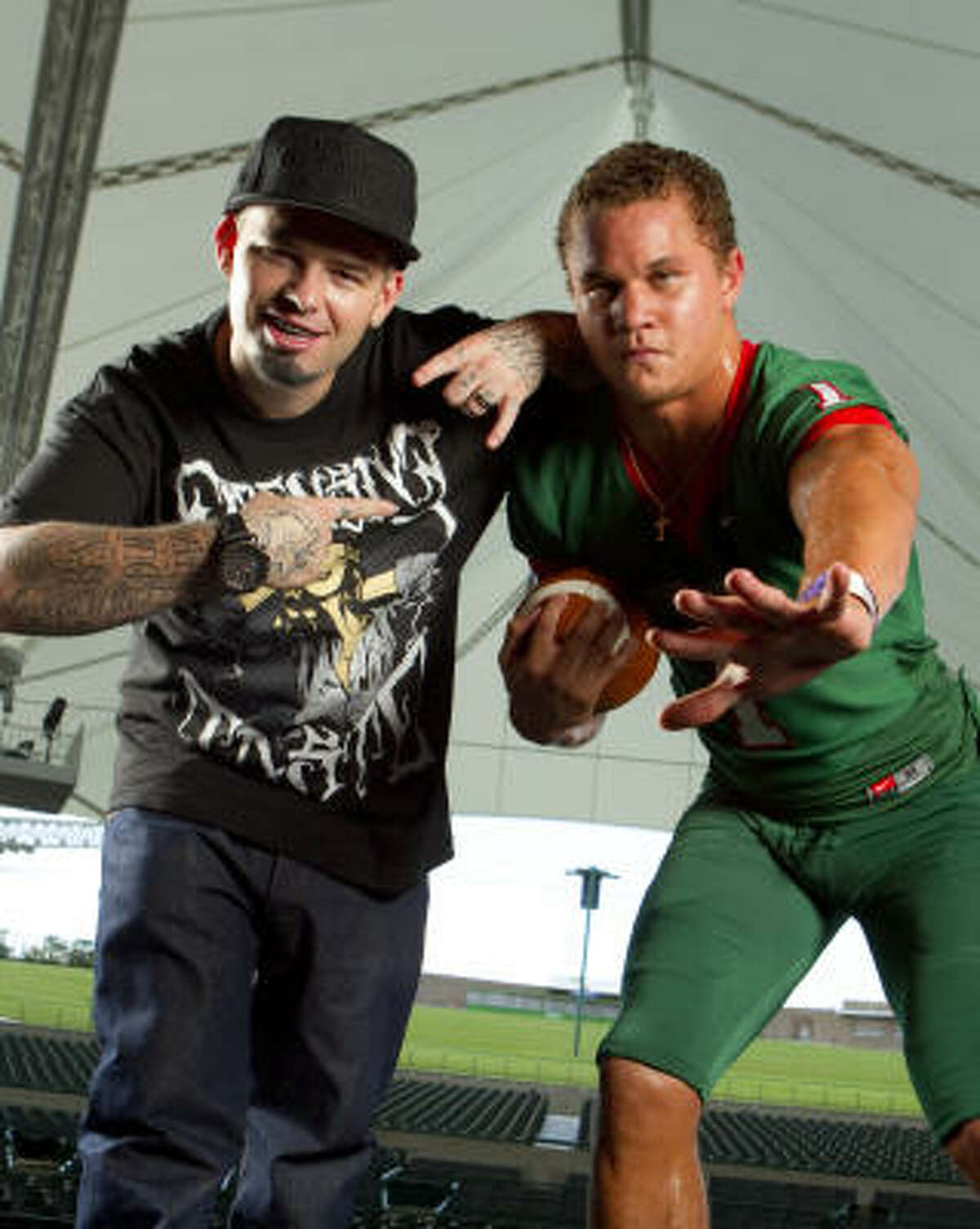 Paul Wall and The Woodlands running back Daniel Lasco both do their best to 'represent' Texas.