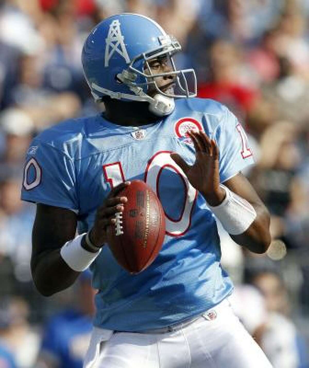 Vince Young, above, and running back Chris Johnson have sparked the Titans' recent resurgence.