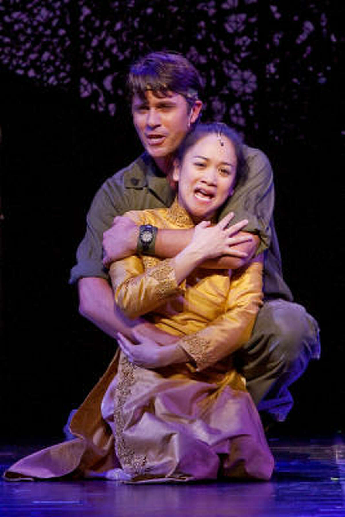 Melinda Chua and Eric Kunze take on the roles of Kim and Chris in Theatre Under The Stars’ Miss Saigon, currently playing at Hobby Center.