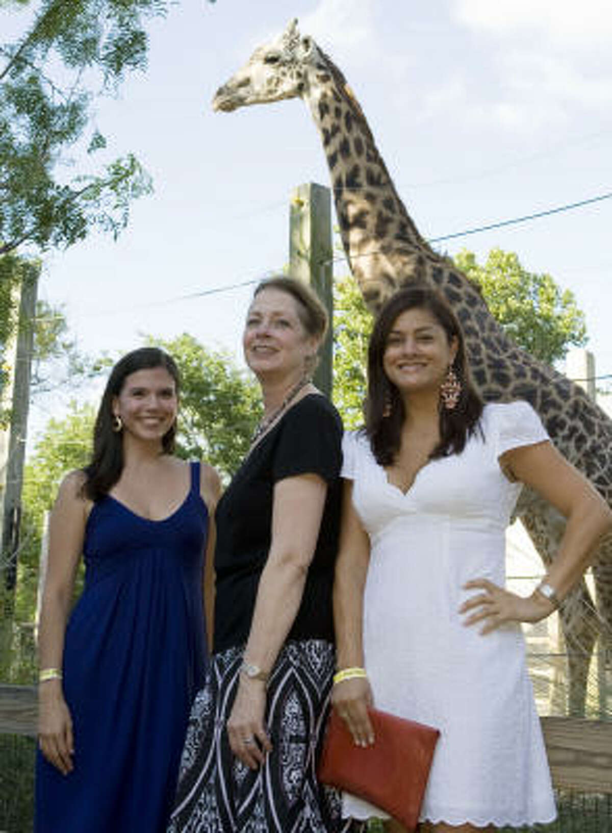 Joining the Houston Zoo’s Flock party were advisory committee member Gloria Luna, from left, Zoo CEO Deobrah Cannon and advisory committee member Katherine Orellana.