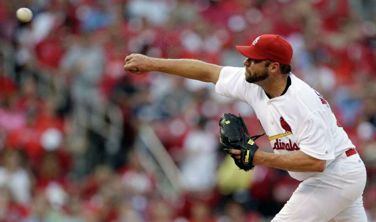 St. Louis Cardinals starting pitcher Jake Westbrook throws during the first inning of a baseball game against the Houston Astros on Tuesday, July 26, 2011, in St. Louis.