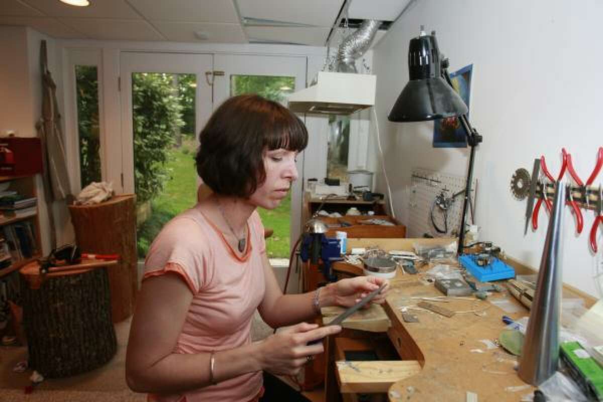 Alicia Istanbul works in her basement studio.