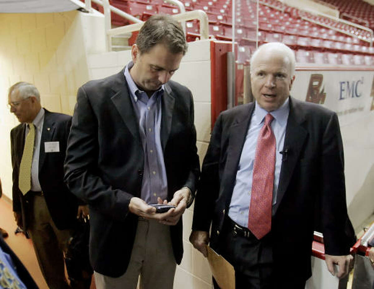 John Weaver, shown with Sen. John McCain last year, led the Republican's first primary bid for the White House in 2000.