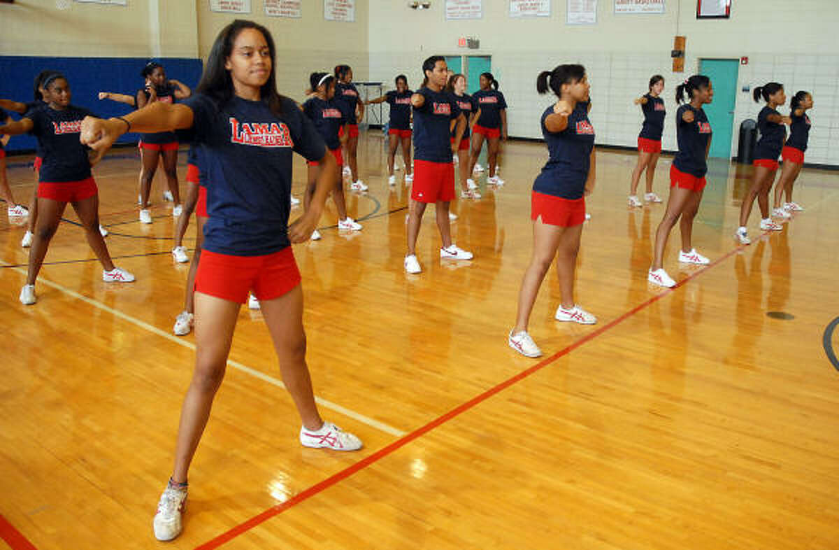 Lamar High cheerleaders catch Redskins' spirit early