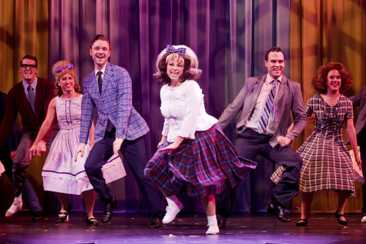 Katrina Rose Dideriksen, center, stars as the irresistible heroine Tracy Turnblad in Theatre Under the Stars' production of 'Hairspray.'