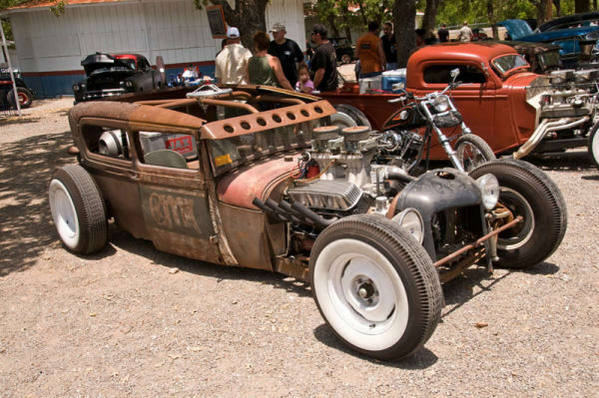 This 1929 Ford is powered by a 468 Chevy big-block engine with a pair of four-barrels, mated with a Corvette six-speed transmission.