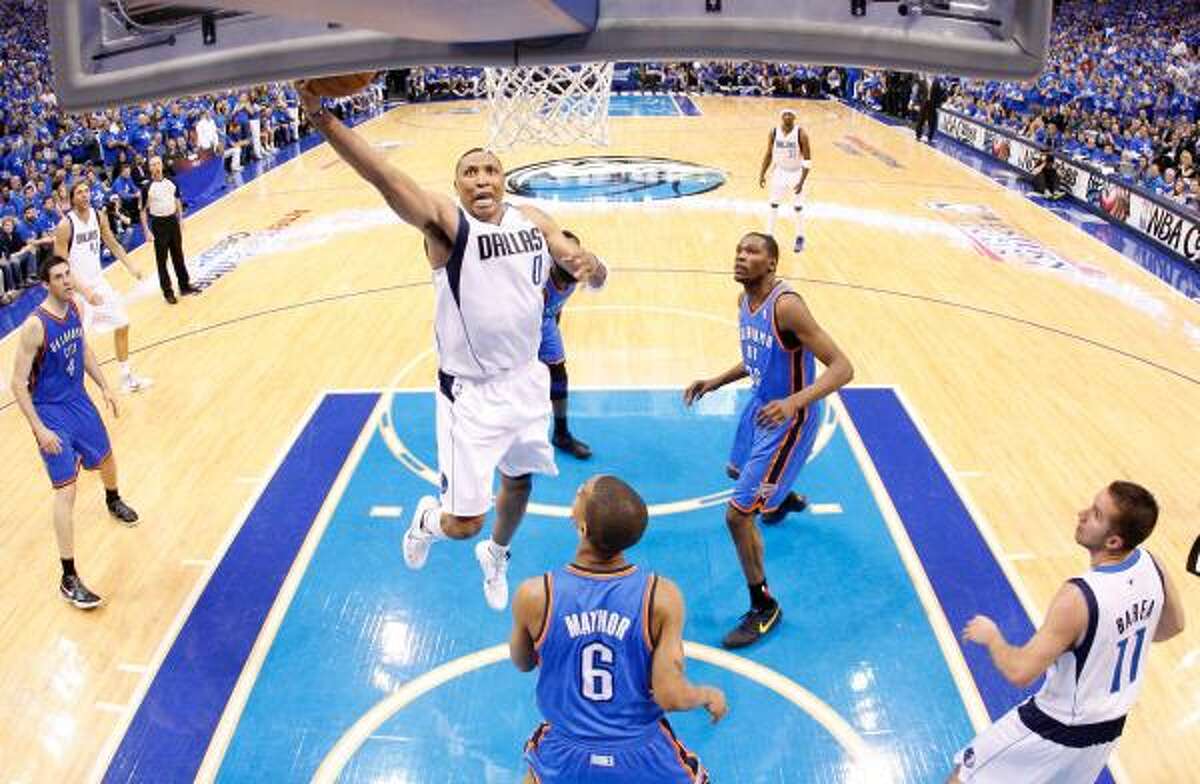Shawn Marion of the Dallas Mavericks goes up for a shot over Eric Maynor #6 of the Oklahoma City Thunder.