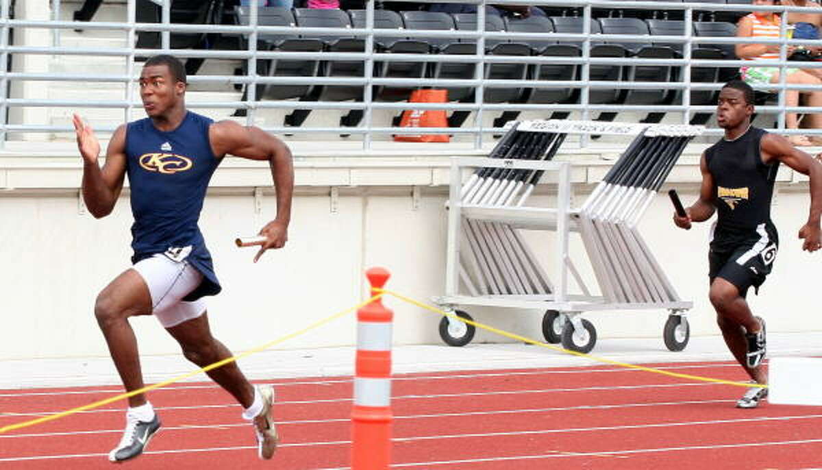 Klein Collins' Charles Jackson flies around the curve in the 400-meter relay.