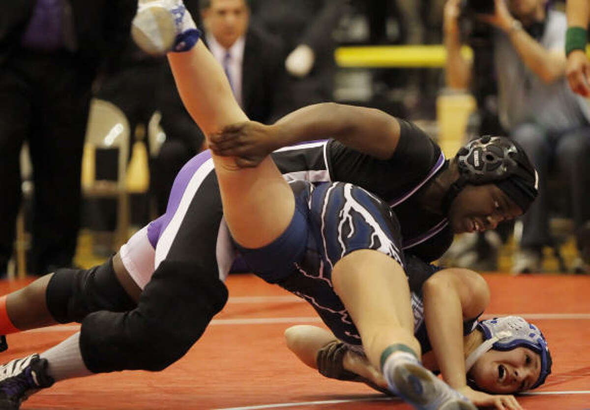 Morton Ranch's Tarkyia Mensah defeated Bryan's Jenna Goen to win gold in the 128-pound class. Her sister, Tamyra Mensah, won the 138-pound class.