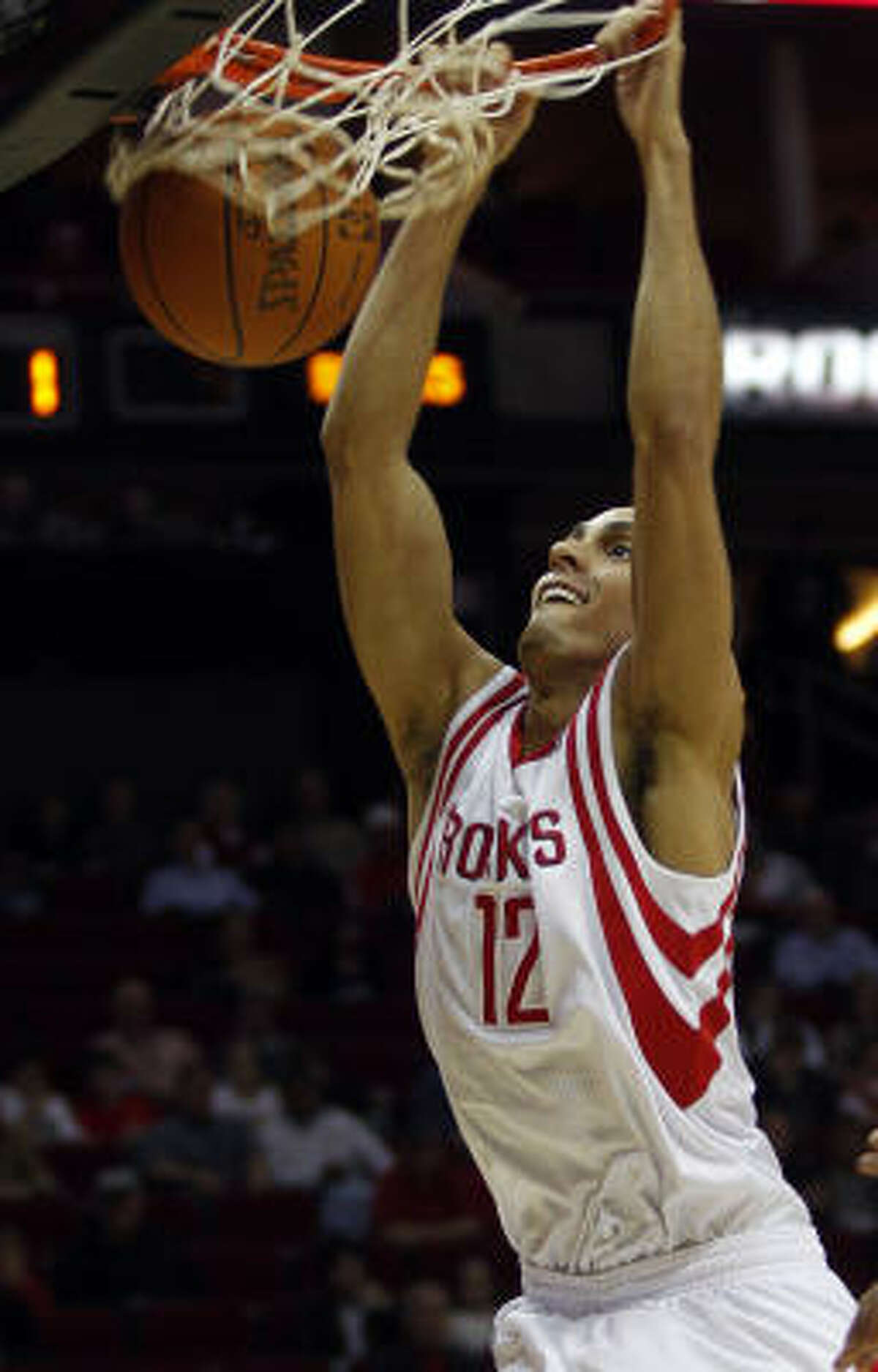 Rockets shooting guard Kevin Martin dunks the ball against the Bucks.