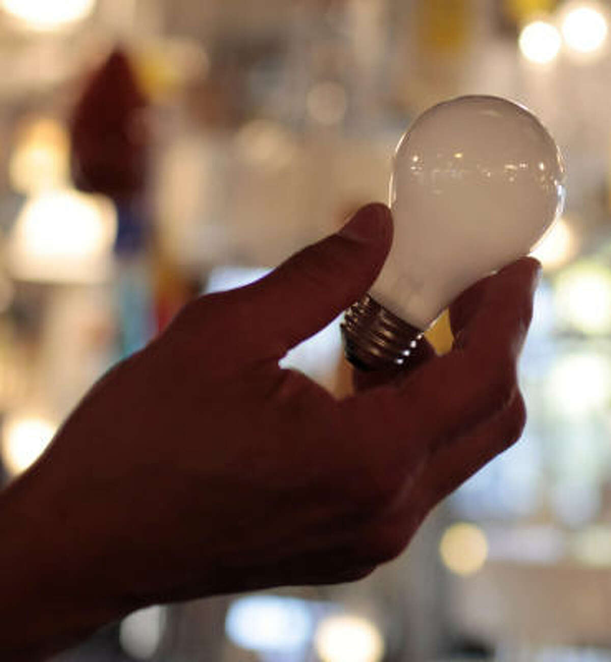 This 100-watt incandescent light bulb is used across the country, but a 2007 law places energy-efficiency restrictions on them, encouraging use of fluorescent bulbs.