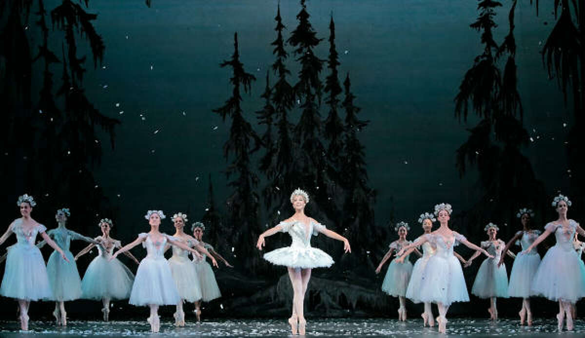 Members of the Houston Ballet dance the snow scene in the traditional Christmas performance.