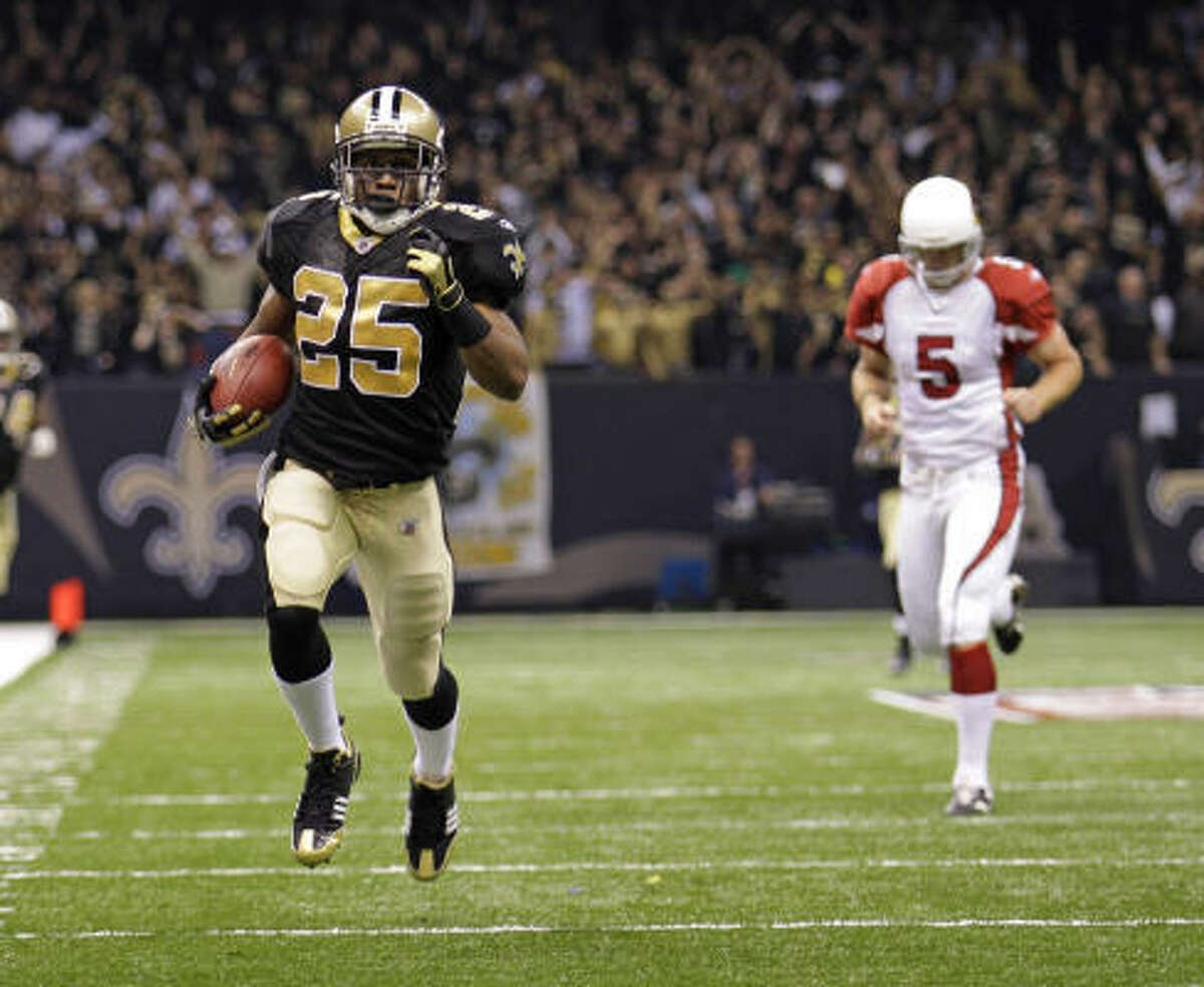 New Orleans Saints running back Reggie Bush scores an 83-yard touchdown on a punt return.