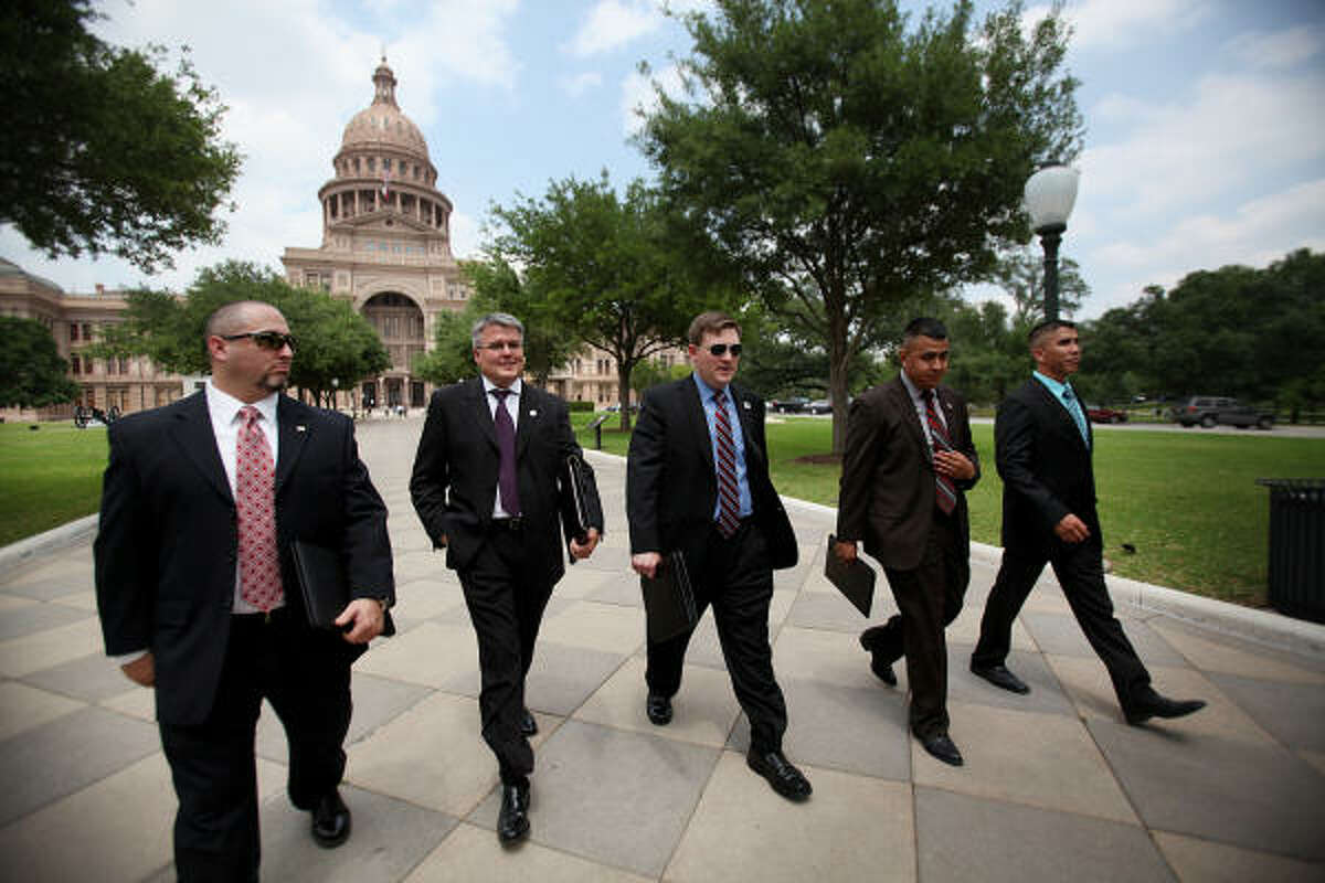 Veterans Jason Williams, Kevin Barber, John Boerstler, Eduardo Rodriguez and Marty Gonzalez leave the Capitol after lobbying for military voting reform. Boerstler, 29, of Missouri City, is president of the Houston-based Lone Star Veterans Association, which planned the April 21 trip to Austin.