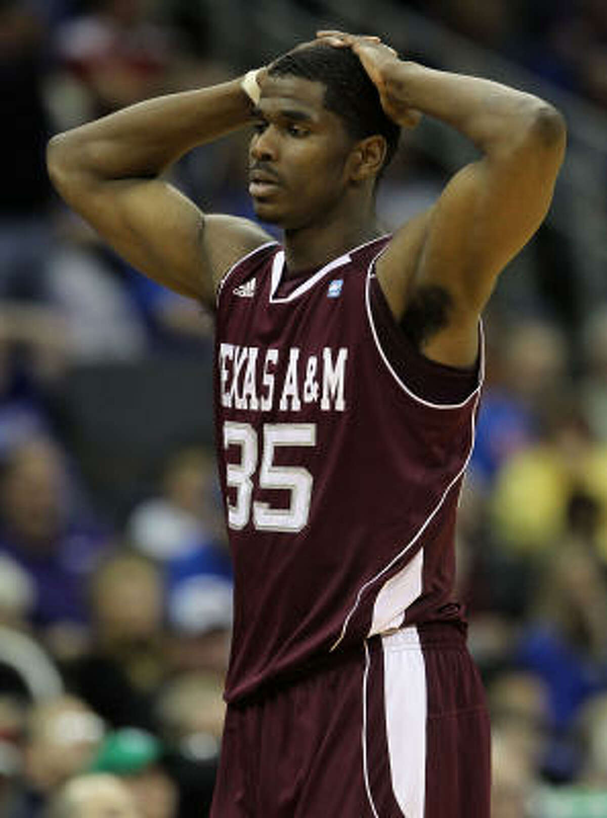 Texas A&M's Ray Turner reacts to a play against the Texas.