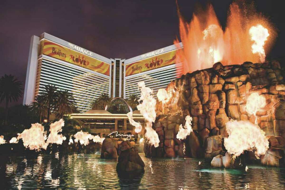 The volcano at the Mirage on the Las Vegas Strip erupts with flames dancing to music from Grateful Dead drummer Mickey Hart and Indian tabla musician Zakir Hussain.