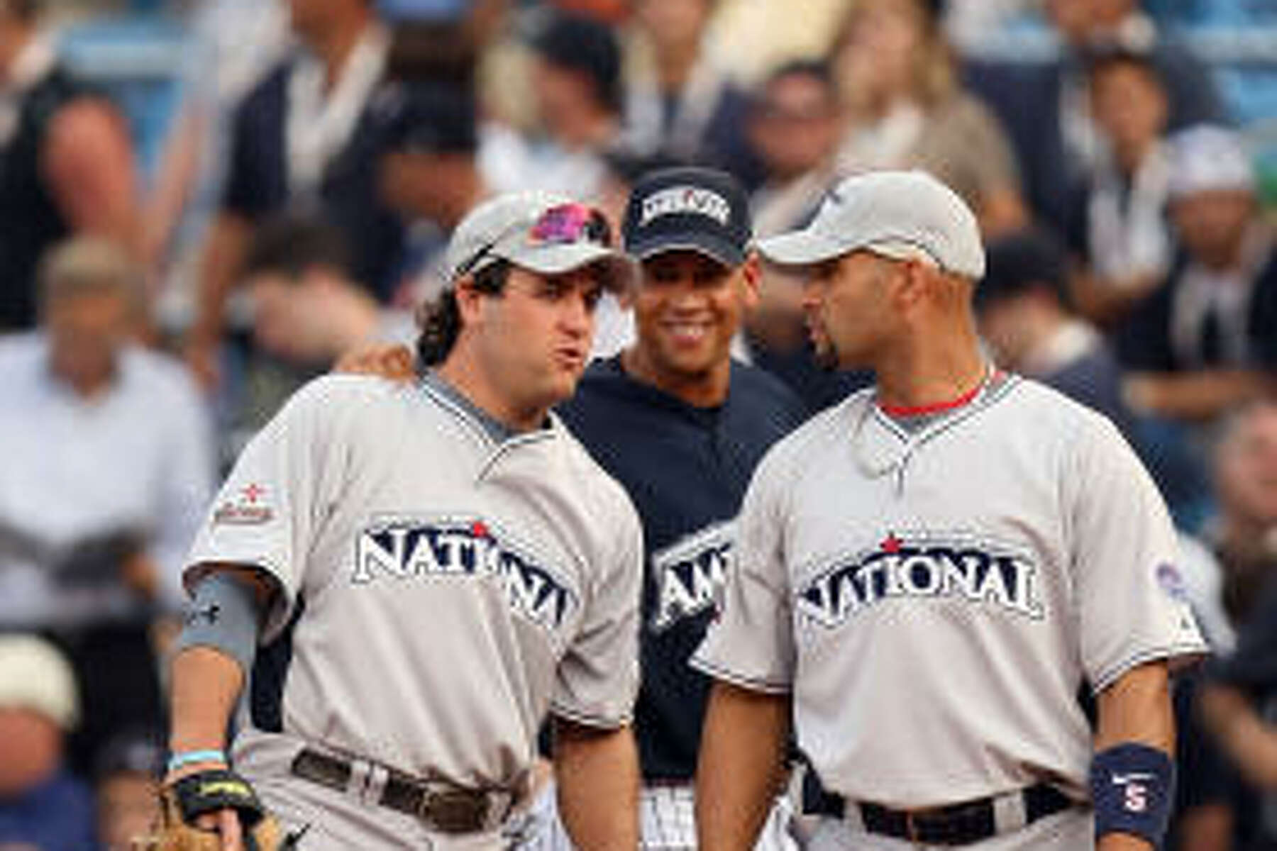 St. Louis Cardinals Lance Berkman embraces Albert Pujols after the