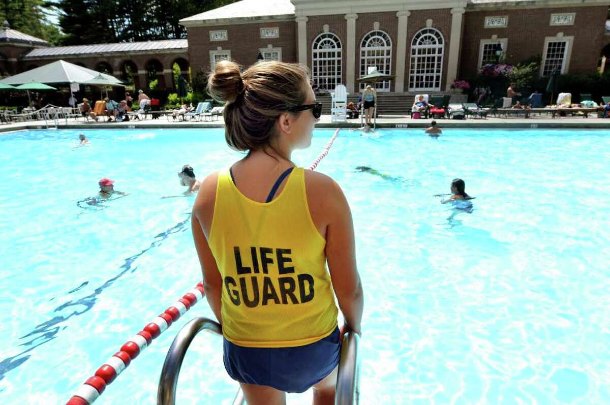 Life guard Marie Mongeon, 18, who will attend the University of Rochester in August, watches over swimmers at Victoria Pool on Wednesday, July 27, 2011, at Saratoga Spa State Park in Saratoga Springs, N.Y. (Cindy Schultz / Times Union)