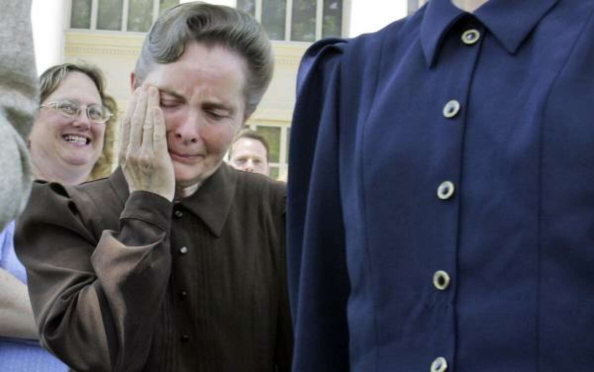Fundamentalist Church of Jesus Christ of Latter Day Saints member Marie Steed cries last week in San Angelo after hearing that a court ruled the state had no right to seize most of the sect's children.