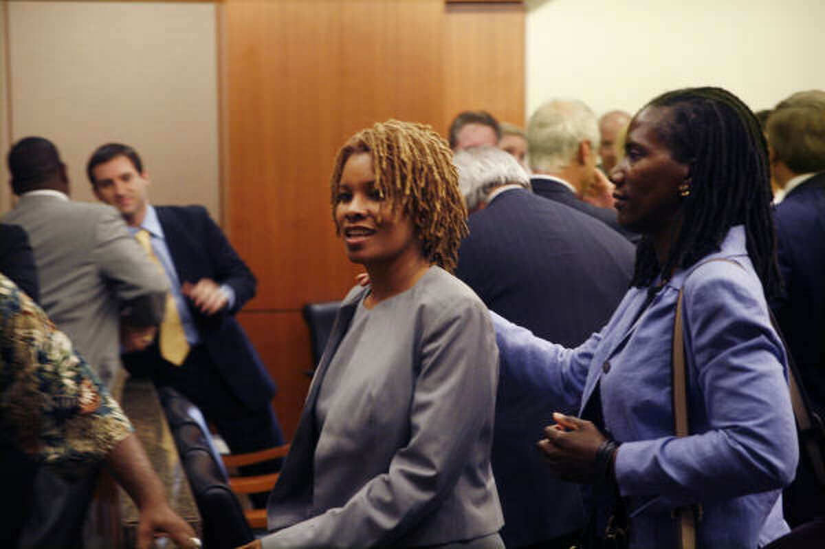 Continental Airlines flight attendant Sharon Brown leaves the courtroom Thursday after a Harris County jury determined that Lakewood Church co-pastor Victoria Osteen did not assault her.