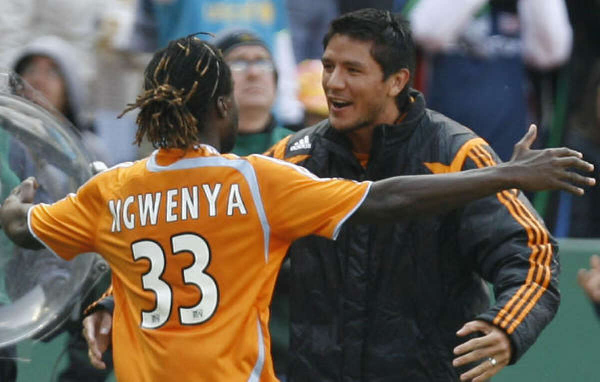 The departure of Joseph Ngwenya, left, leaves Brian Ching as one of the Dynamo's only big guns at forward.