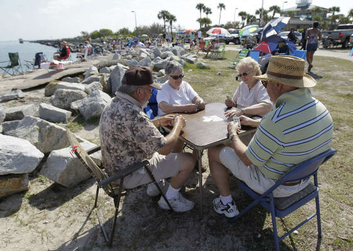 Spectators wait for the launch at Jetty Park near Cape Canaveral, Fla.