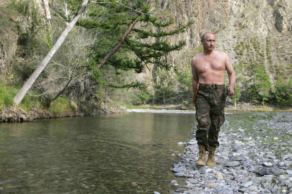 Russian President Vladimir Putin walks along the Khemchik River in the Tuva region of Siberia last week.