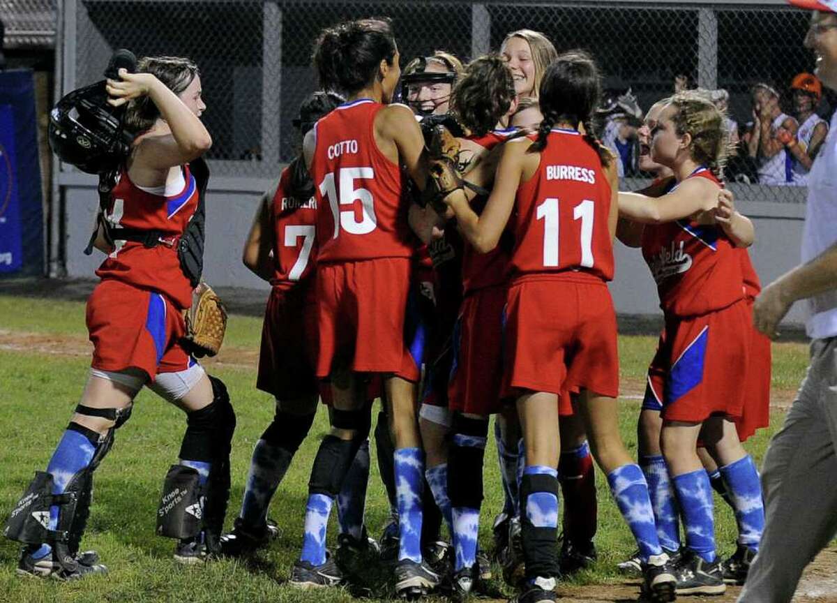 Fairfield celebrates its win over Maine 7-6, during the 2011 Little League Softball Eastern Regional in Bristol, Conn. on Friday July 29, 2011.