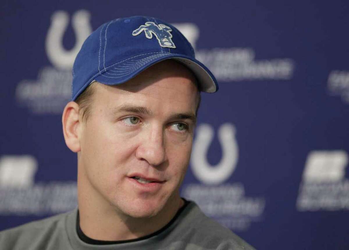 FILE ** Indianapolis Colts quarterback Peyton Manning reacts after