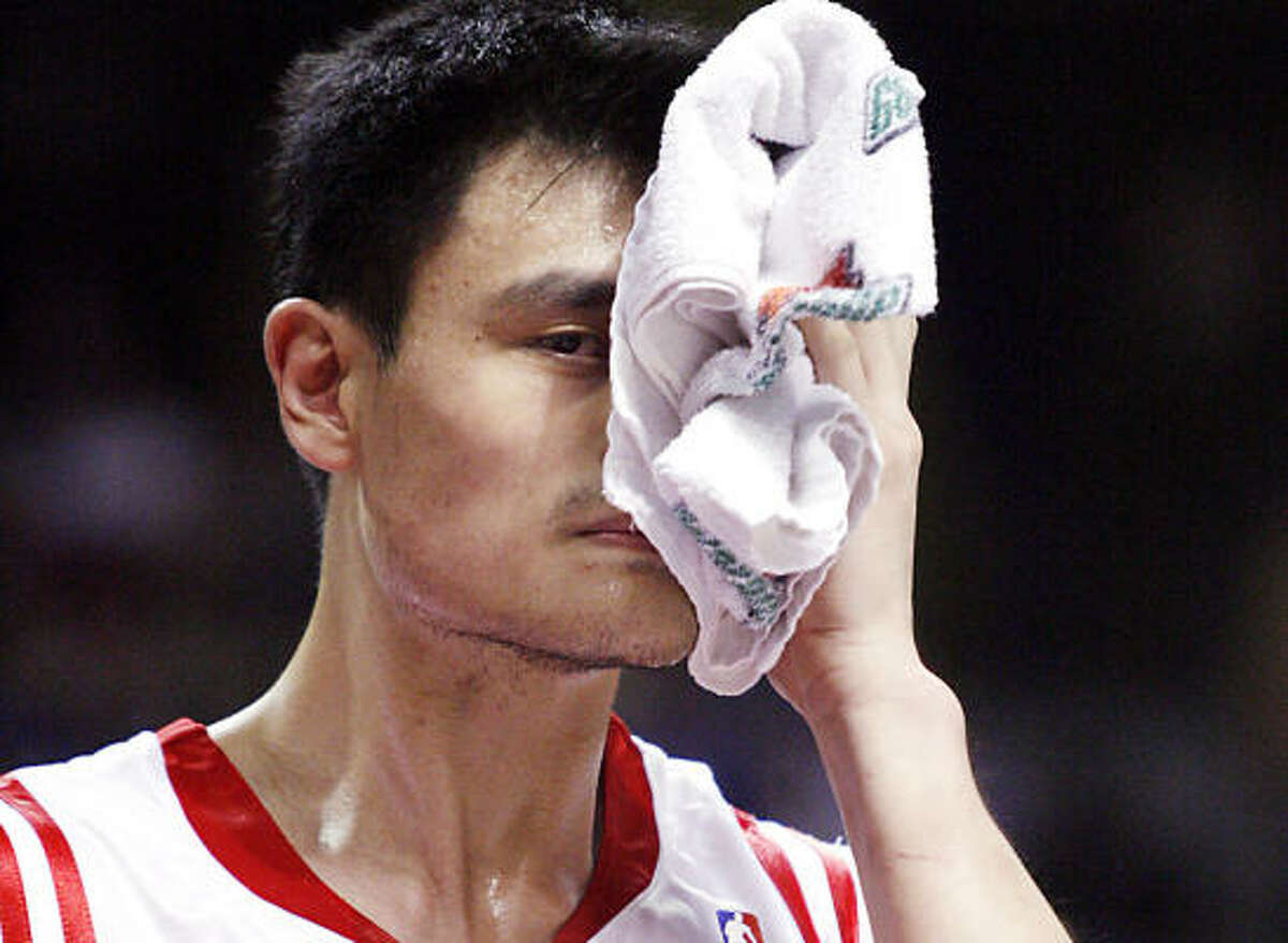 Yao Ming and Tracy McGrady were both injured in Sunday's trip-closing loss. Shane Battier was hurt Saturday.