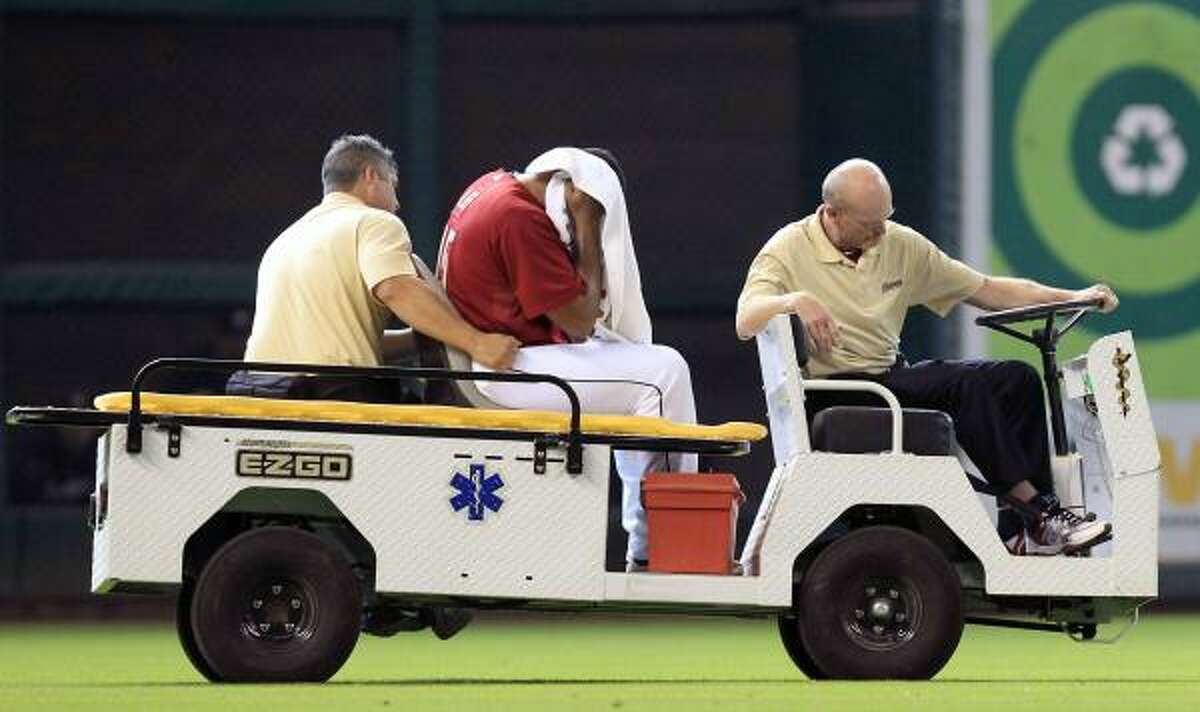May 1: Astros 5, Brewers0 Astros left fielder Carlos Lee rides off the field after colliding with Angel Sanchez in the seventh inning. Lee went to a hospital for X-rays.