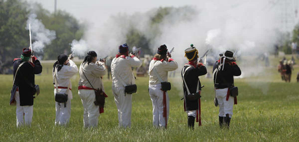 Re-enactors simulate events the day before the Battle of San Jacinto on the grounds of the San Jacinto Battleground.