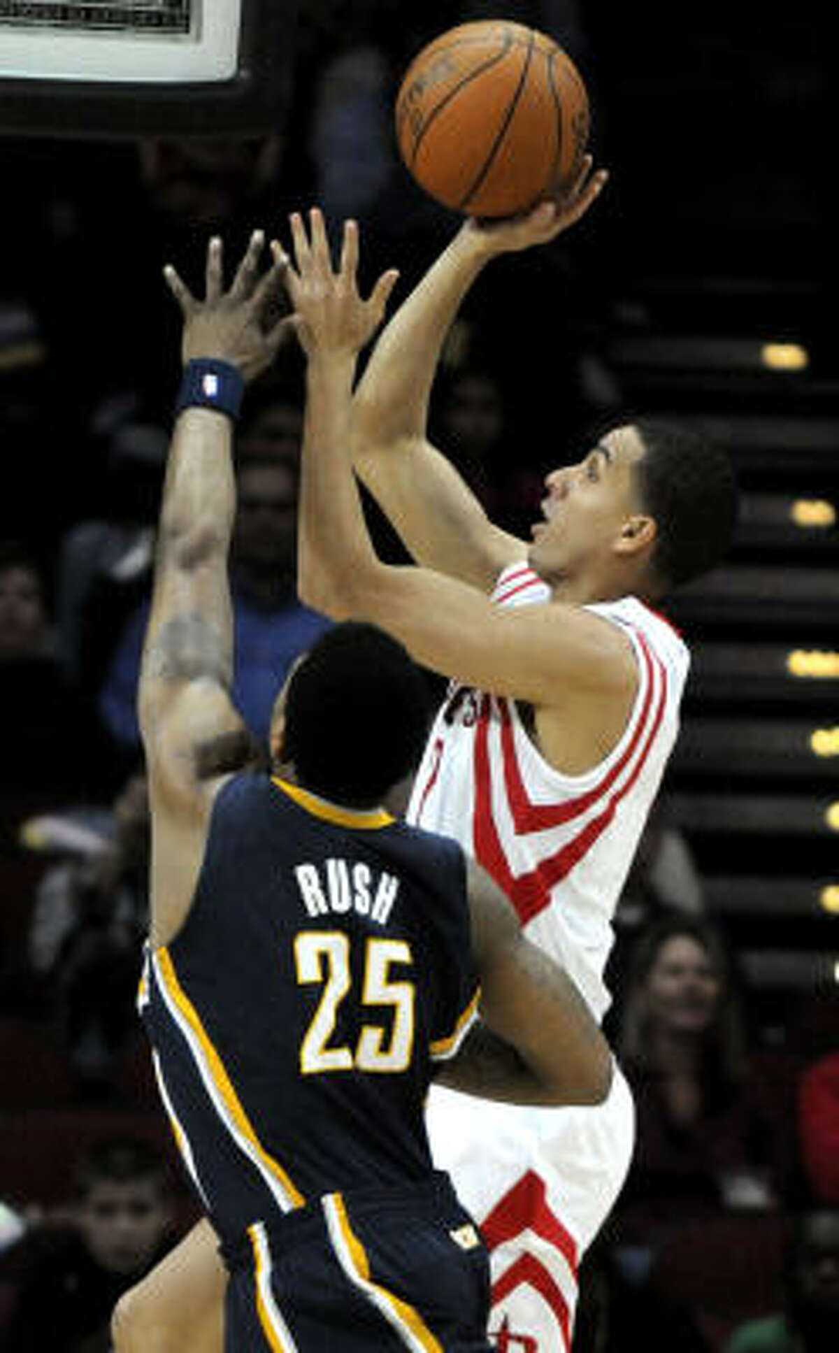 Rockets guard Kevin Martin shoots over Indiana's Brandon Rush.