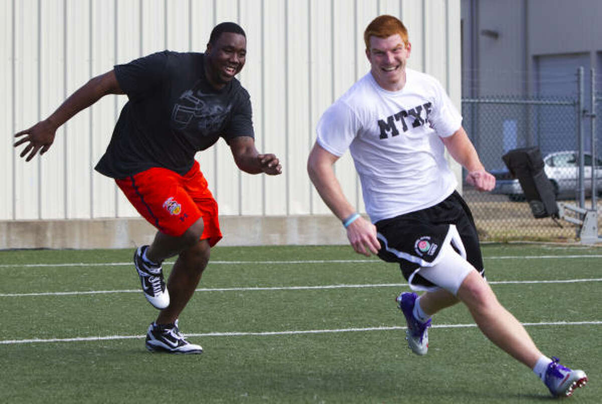 Nick Fairley tries to chase down Andy Dalton in a scene many would have liked to see in the BCS title game. Instead, Fairley helped Auburn beat Oregon for the title. Dalton led TCU to an unbeaten season and a Rose Bowl win against Wisconsin.