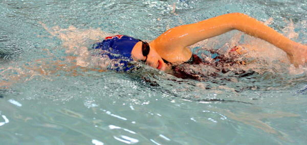 Oak Ridge's Ashlunn Spoon competes in the 500-yard freestyle swim.