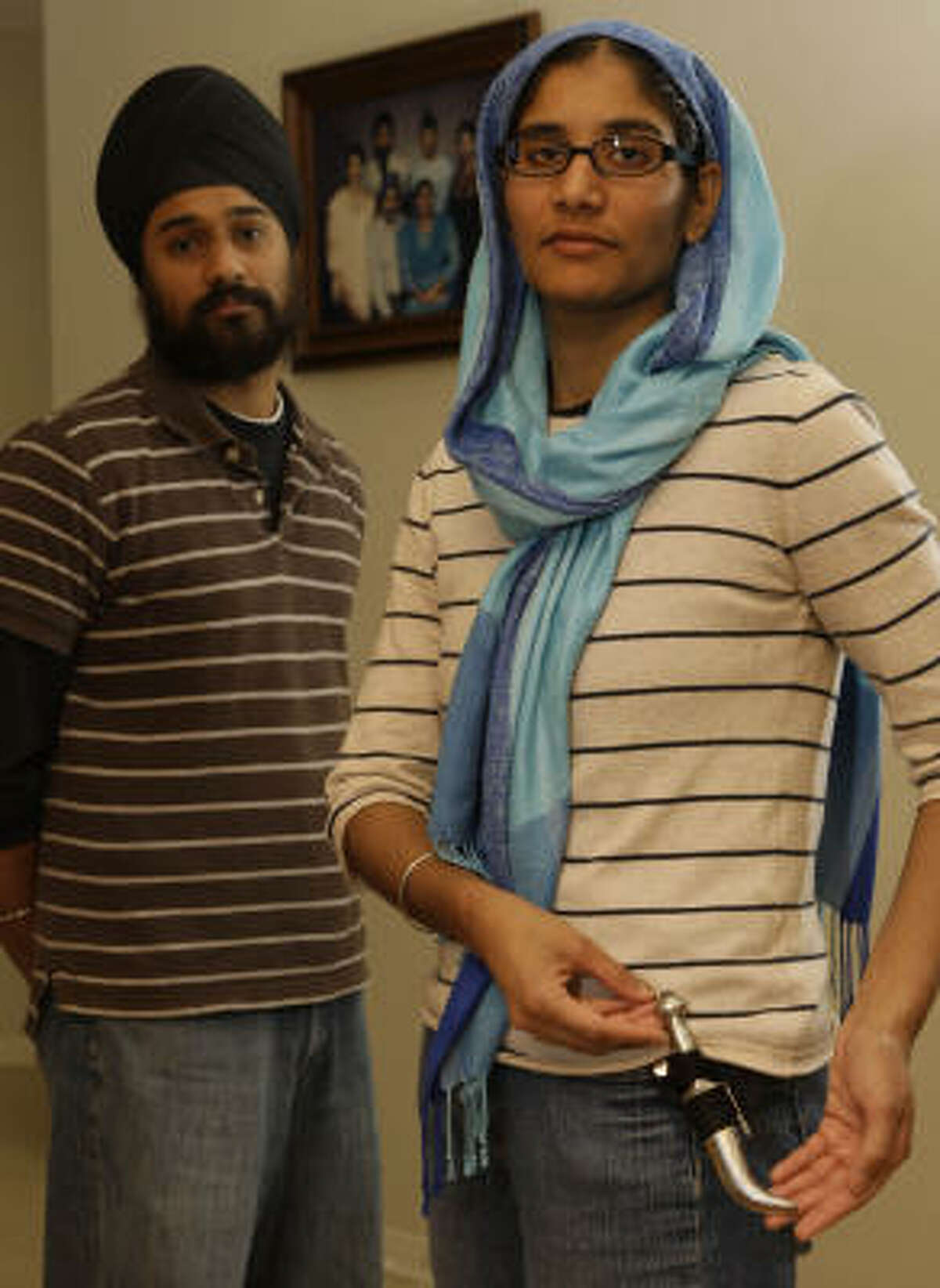 Kawaljeet Kaur Tagore, right, sued the Internal Revenue Service this week. The agency fired her for refusing to take off her kirpan while at work.
