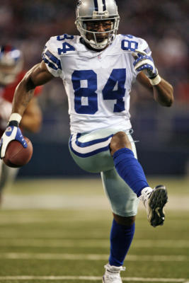 Dallas Cowboys Tony Romo runs out of the pocket in the first quarter  against the New York Giants in week 13 of the NFL season at Giants Stadium  in East Rutherford, New