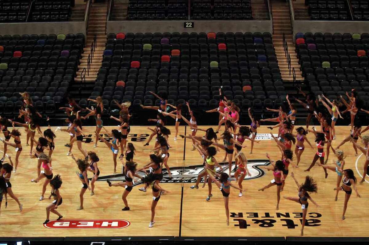 Spurs Silver Dancers hopefuls learn the first routine they will compete with during auditions at the AT&T Center on Saturday, July 30, 2011.