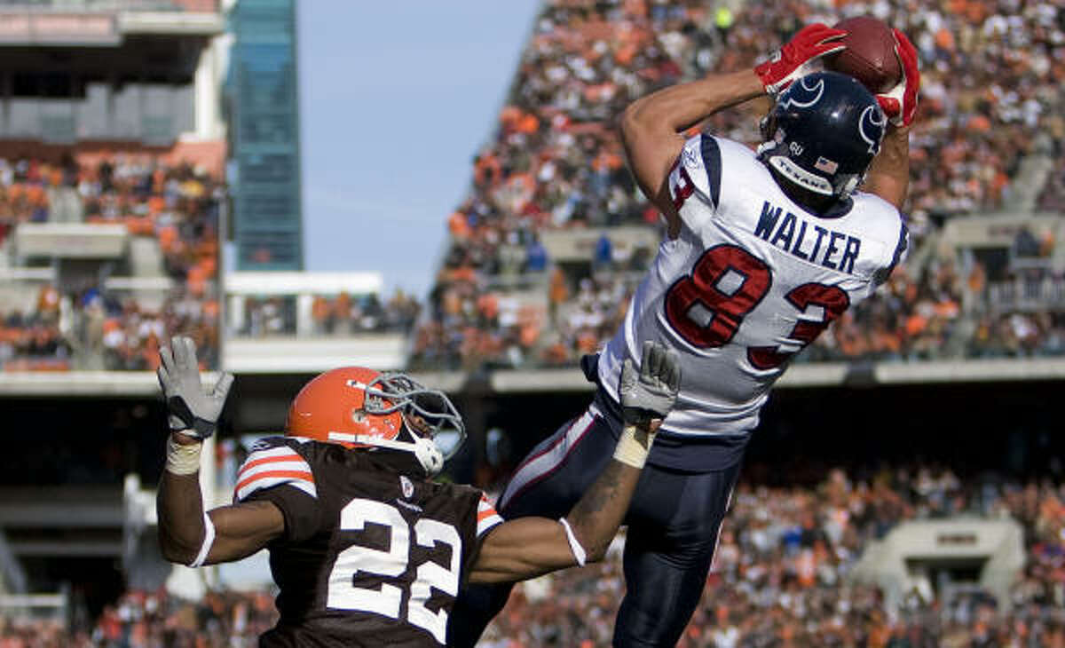 Texans receiver Kevin Walter hauled in a 17-yard TD pass over Browns DB Brandon McDonald on the first drive.