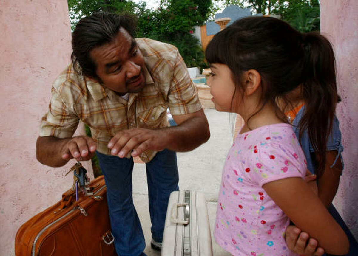 Director Baldemar Rodriguez talks with 8-year-old actress Kayla Valadez during a day of filming.