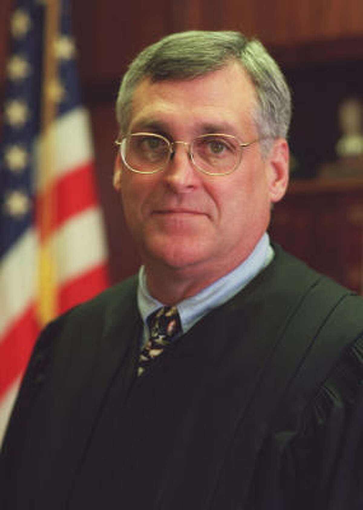 U.S. Federal District Judge Sam Kent, shown in 2001, is accused of harassing and inappropriately touching his 49-year-old case manager in his chambers in March.