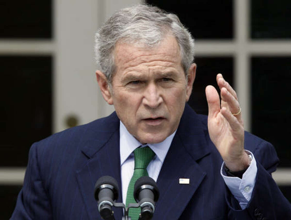 President Bush speaks during a news conference in the Rose Garden of the White House in Washington today.