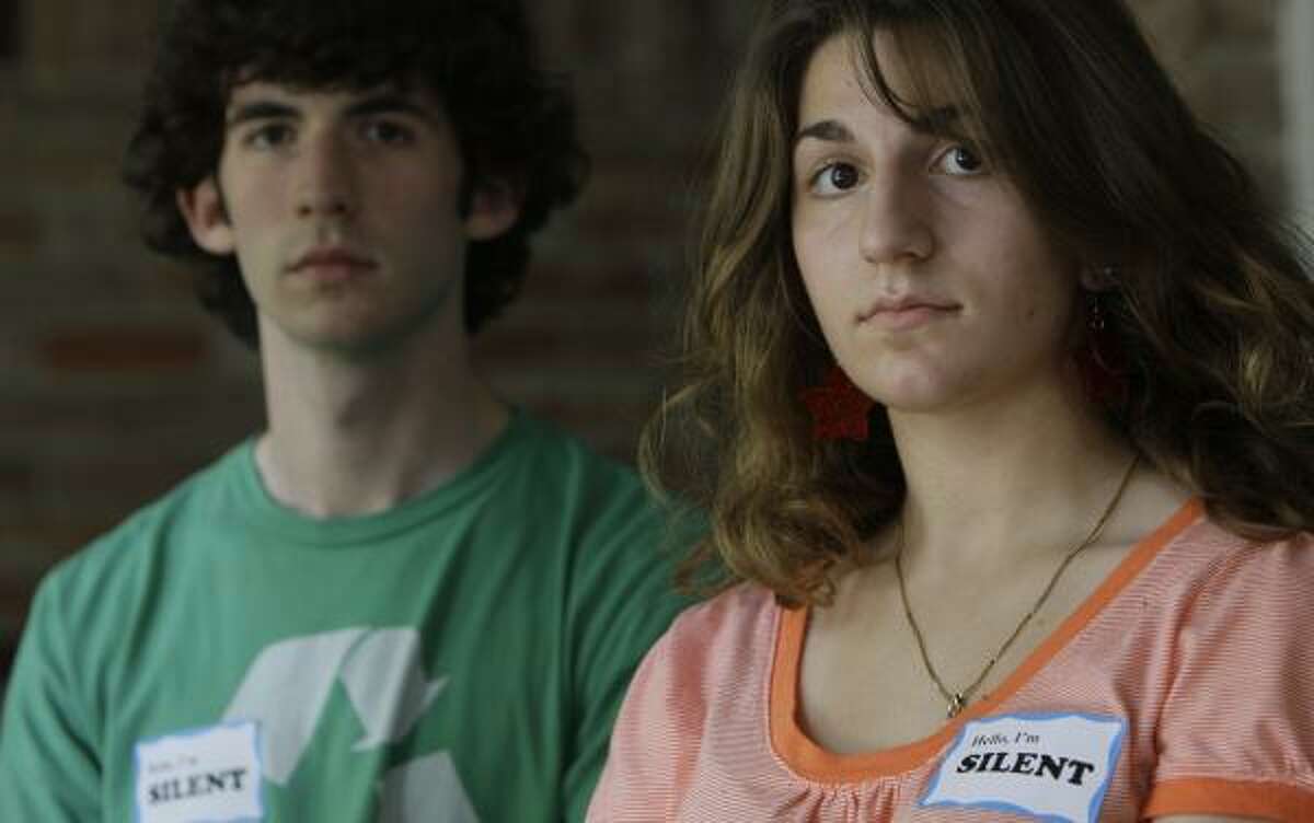Gerald Rich, 18, and Mauria Atzil, of Emery/Weiner High School, last week participated in a Day of Silence, a national event to promote tolerance for gay, lesbian, bisexual and transgender youths.