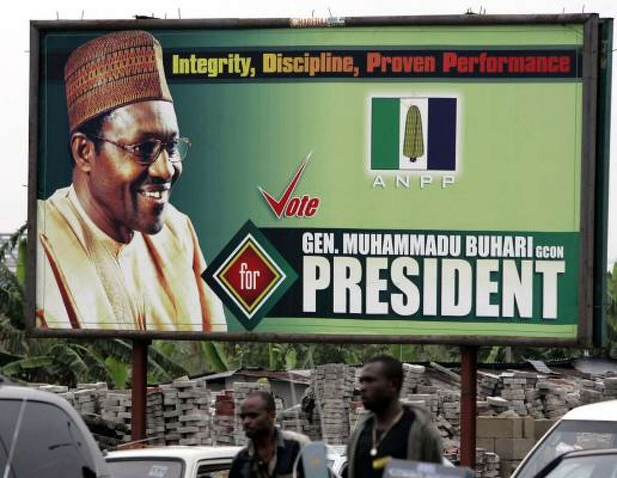 Presidential candidate Gen. Muhammadu Buhari is depicted on an election billboard in Port Harcourt, Nigeria, on Tuesday.