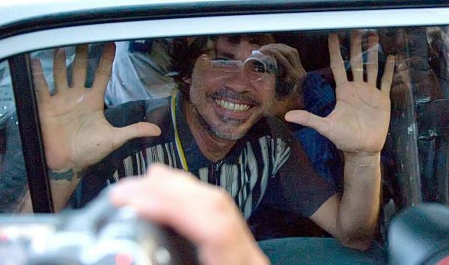 Dissident Cuban rocker set free after paying $28 fine ...