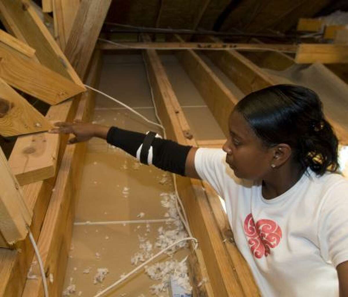 Jeryl Bennett shows poor construction in her Spring home last week.