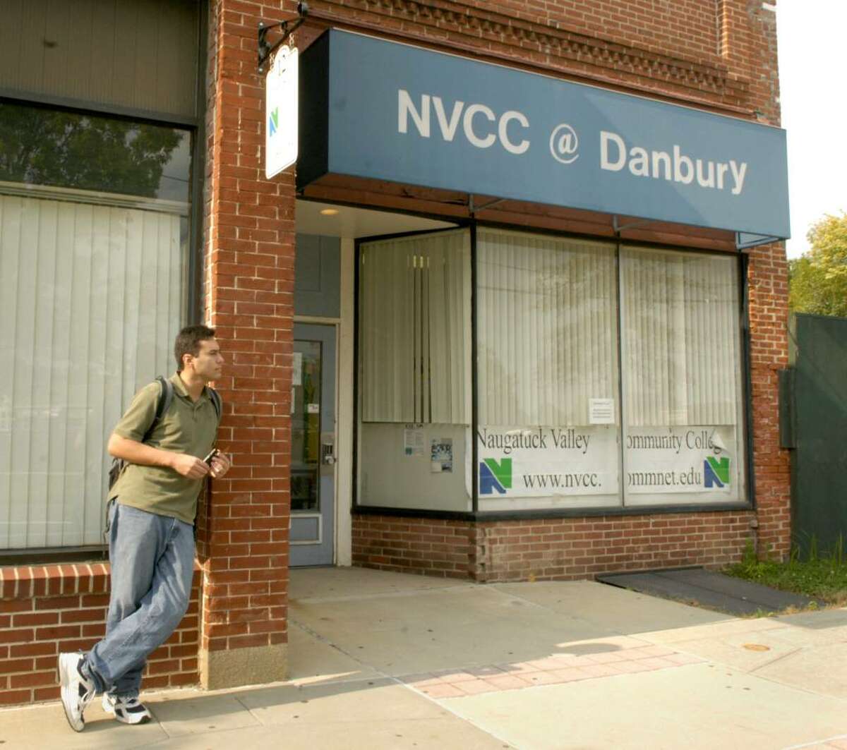 Rafael Hamoy, 23, of New Milford, a first year student, stands outside of the office on Crosby St. in Danbury for Naugatuck Community College, Monday, Sept 28, 2009