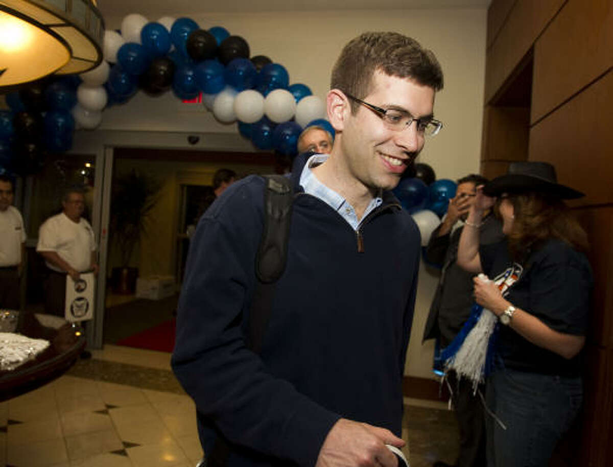 Butler head coach Brad Stevens walks through the lobby of the Sheraton Suites as his team arrives at the team's Galleria area hotel in Houston.