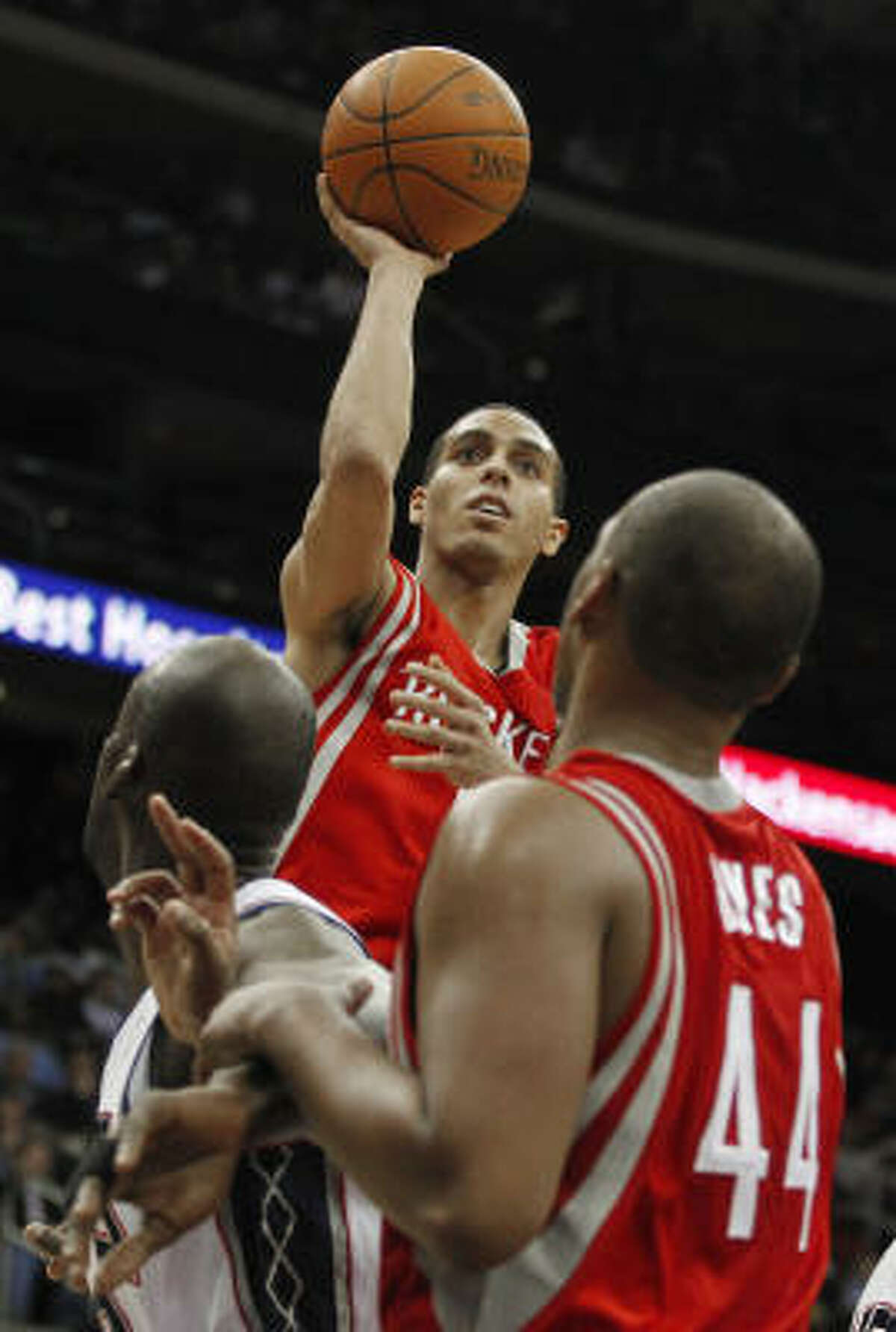 Rockets' Kevin Martin, top, shoots the ball in the third quarter.